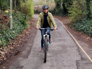 Photo of Saira riding a bike
