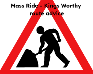 Picture of a roadworks sign, with text "Mass Ride - Kings Worthy route advice"